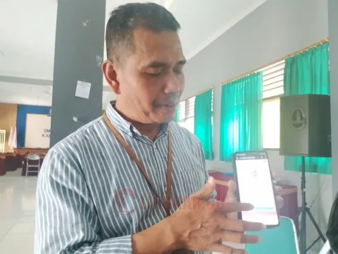 Taufik Mulyadi, guru ekonomi SMA Negeri 2 Karanganyar. Foto: istimewa