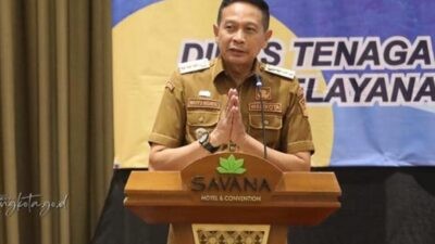 Wali Kota Malang, Wahyu Hidayat saat sosialisasi kenaikan UMK yang digelar oleh Dinas Tenaga Kerja, Penanaman Modal dan Pelayanan Terpadu Satu Pintu (Disnaker PMPTSP) Kota Malang di Hotel Savana, Senin (29/12/2025). Foto; dokumentasi/istimewa