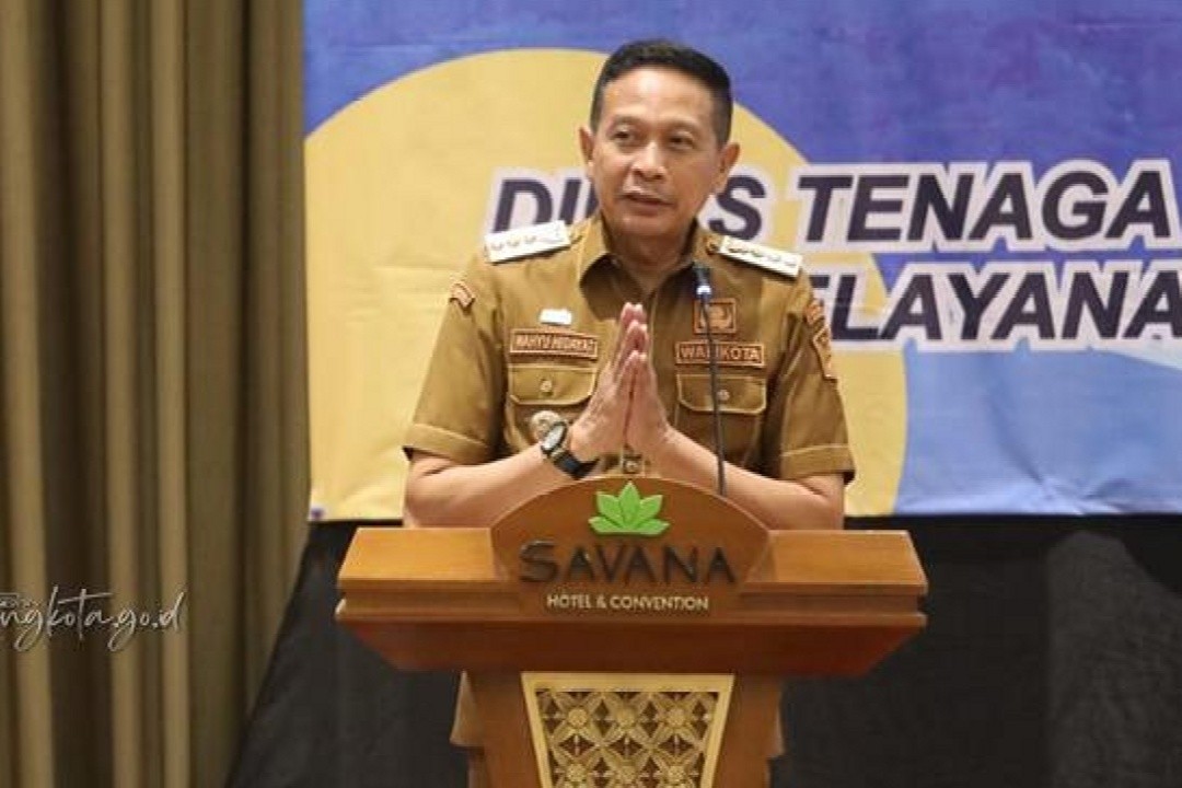 Wali Kota Malang, Wahyu Hidayat saat sosialisasi kenaikan UMK yang digelar oleh Dinas Tenaga Kerja, Penanaman Modal dan Pelayanan Terpadu Satu Pintu (Disnaker PMPTSP) Kota Malang di Hotel Savana, Senin (29/12/2025). Foto; dokumentasi/istimewa