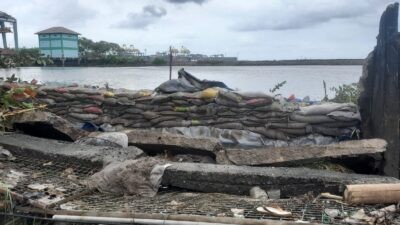 Tanggul kolam retensi Pelindo jebol. (dok Pelindo)